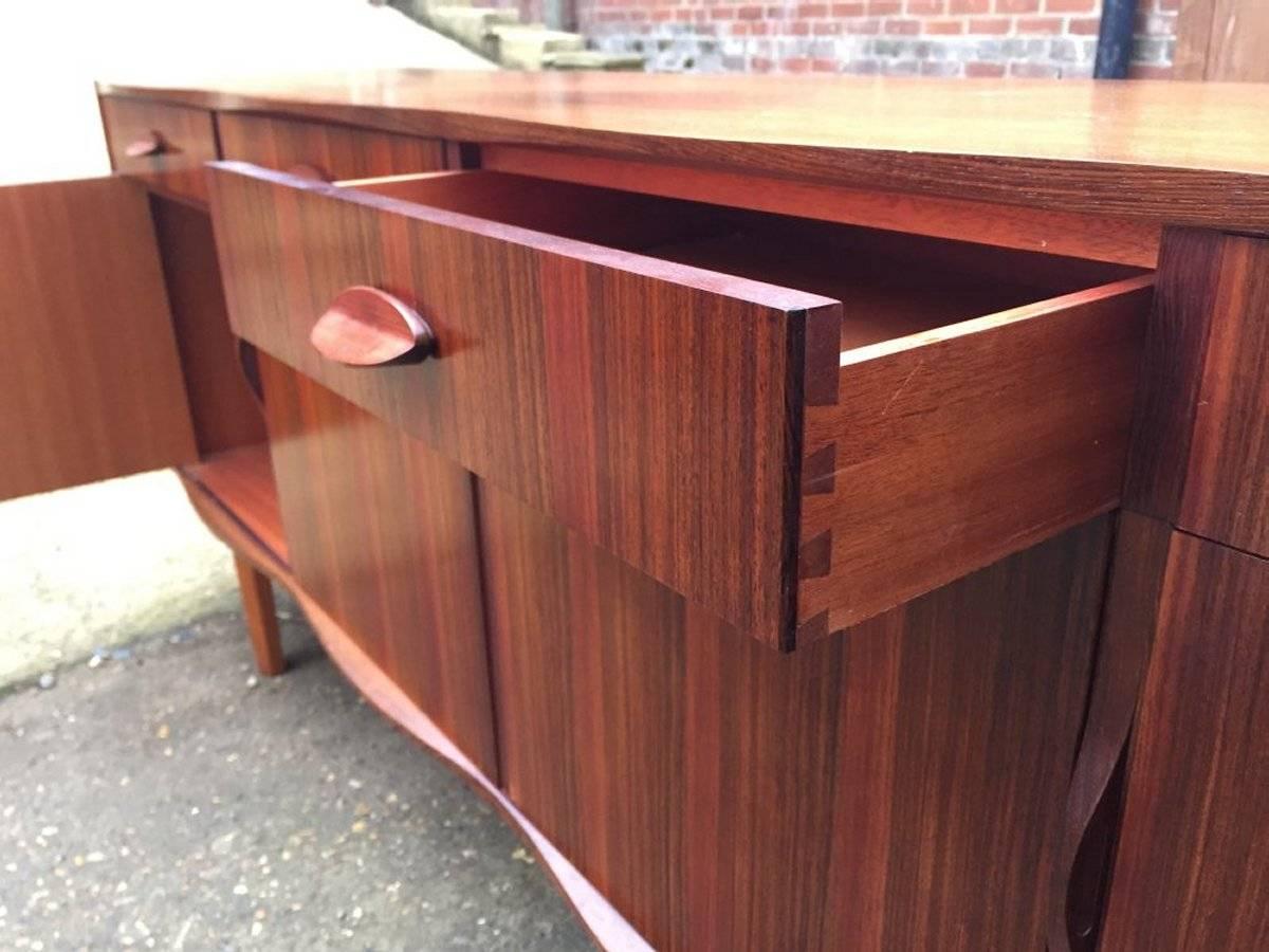 Mid-20th Century Gordon Russell. Designer WH Russell a Rosewood & Mahogany 'Burford' Dining Suite For Sale
