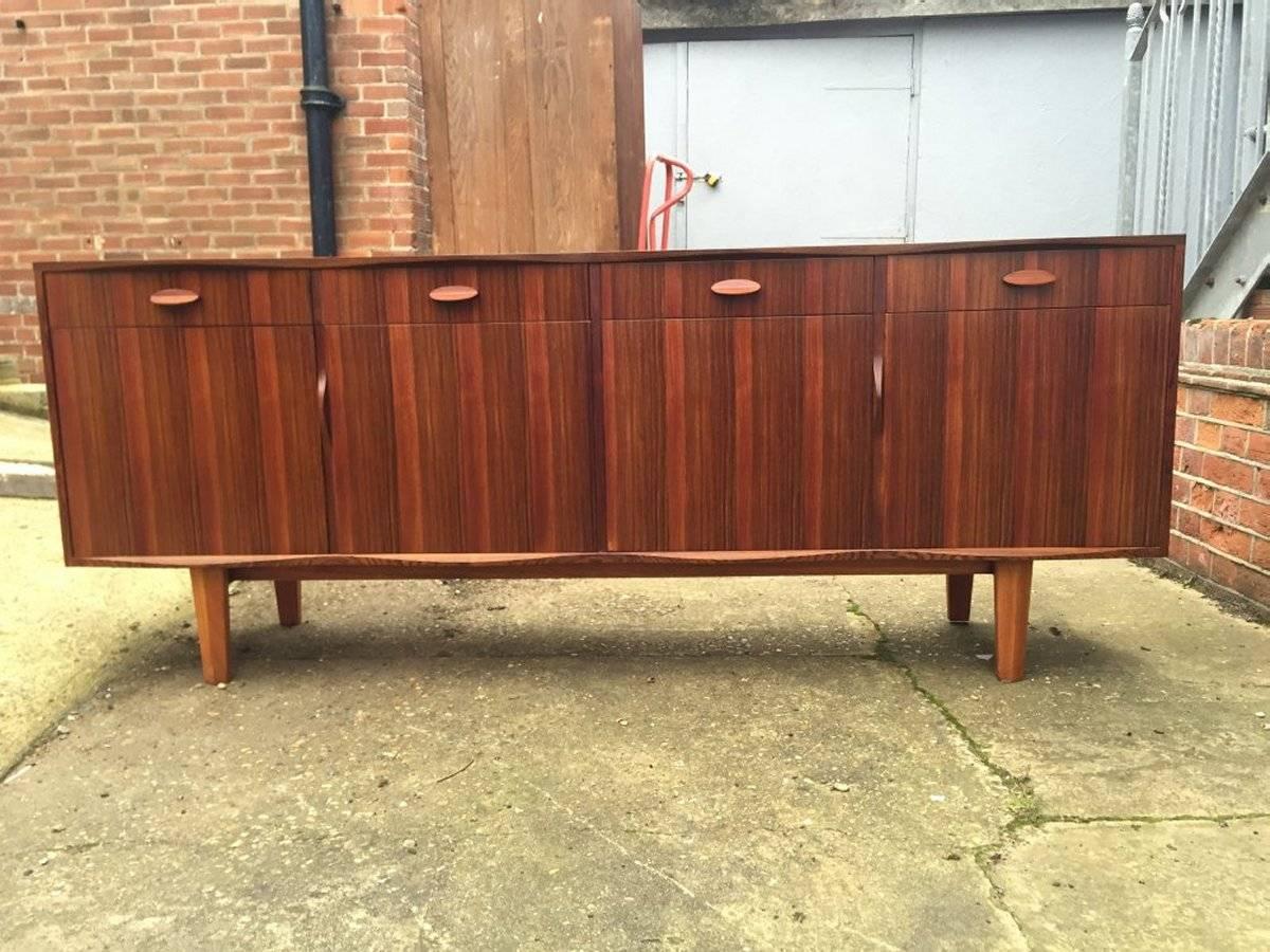 English Gordon Russell. Designer WH Russell a Rosewood & Mahogany 'Burford' Dining Suite For Sale