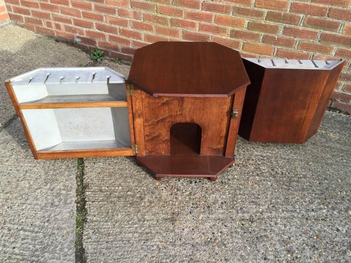 English Heals, Arts & Crafts Oak Cocktail table with Bottle Storage in the Side Doors For Sale