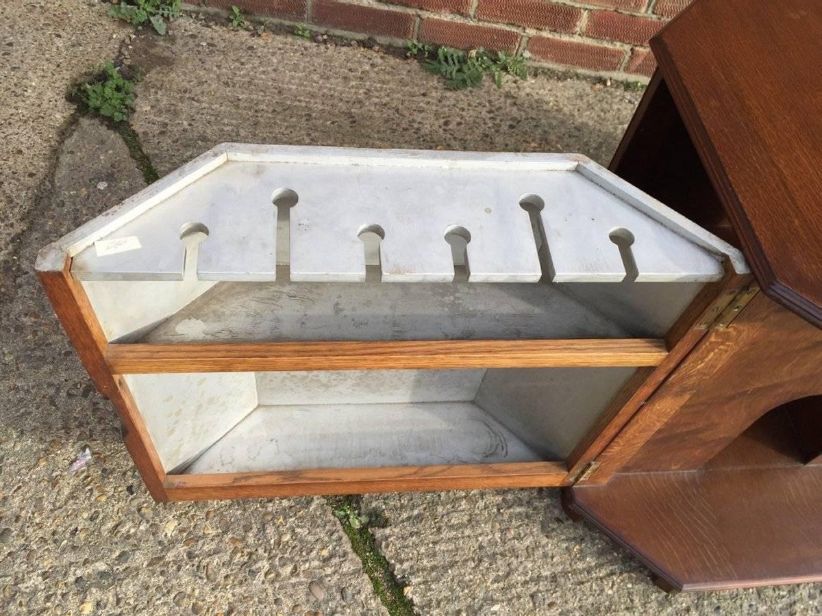 Heals, Arts & Crafts Oak Cocktail table with Bottle Storage in the Side Doors In Good Condition For Sale In London, GB