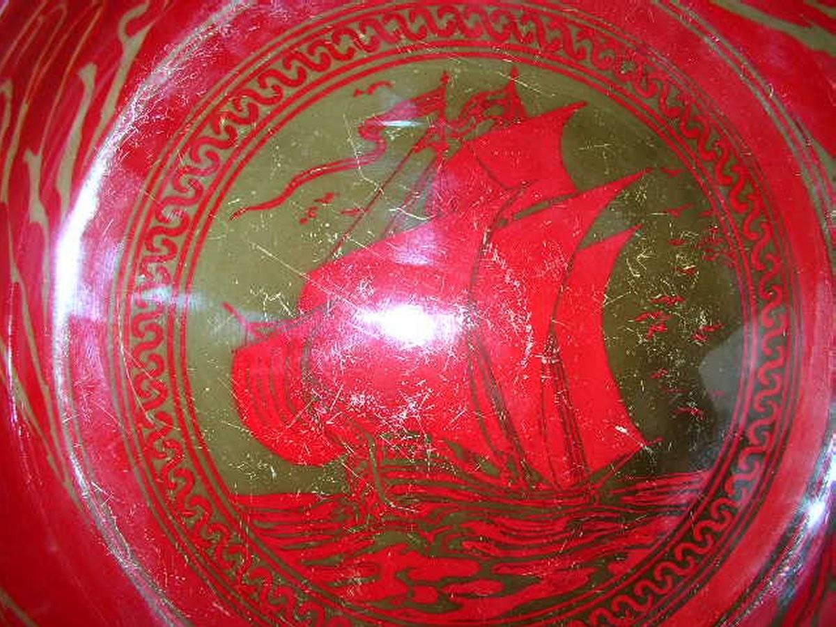 Bernard Moore. A Red Flambe' bowl painted by E. Hope Beardmore with a galleon in full sail on the open sea. 
Some surface scratches to the inside.
 