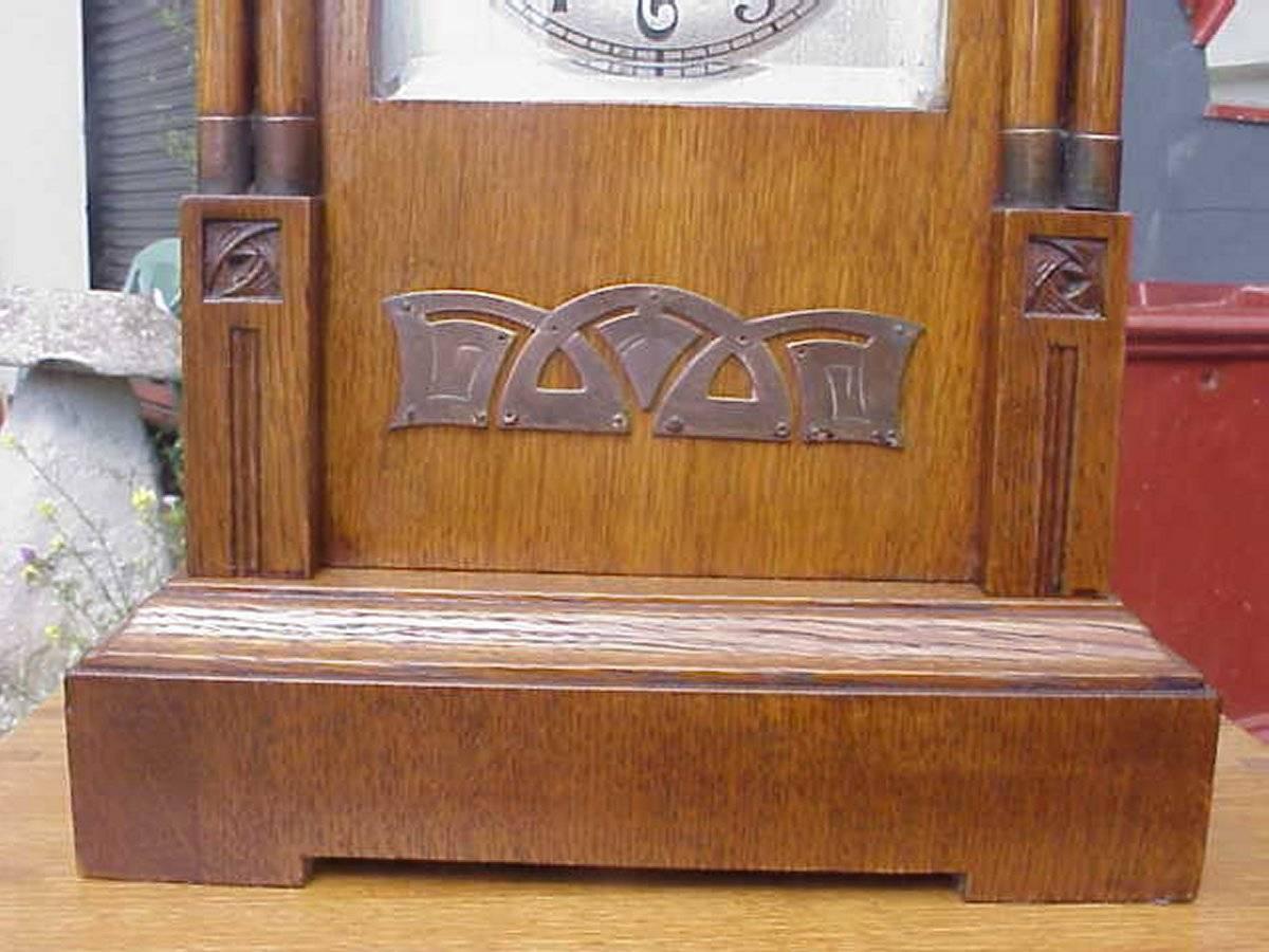 Vienna Secession A Continental Arts & Crafts Oak Mantle Clock with Carved Stylised Glasgow Roses For Sale