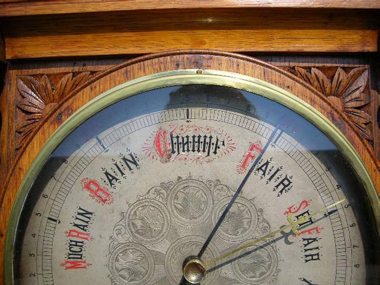 A Large Gothic Revival Carved Oak Barometer with a Rare Snail Tail