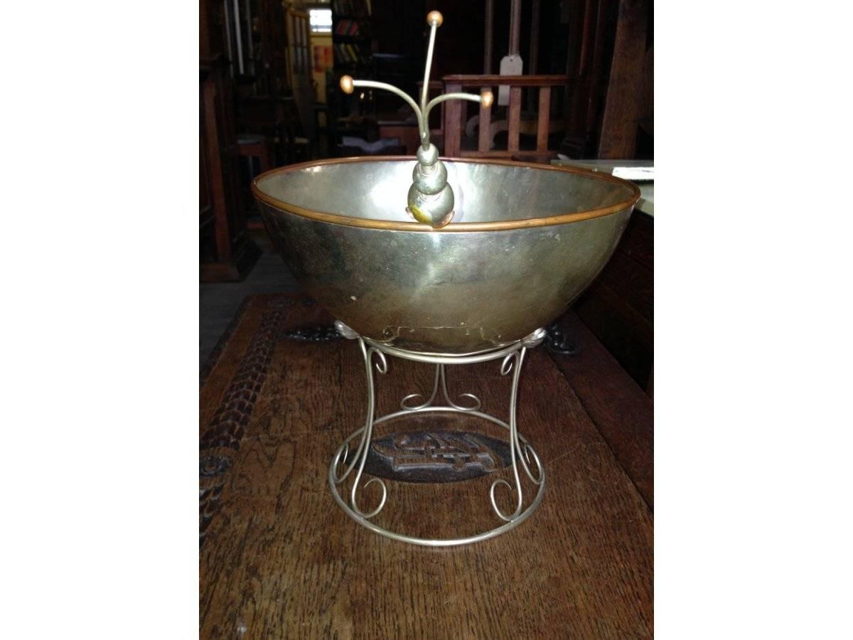 A fine quality handmade Arts & Crafts style silver plated punch bowl and matching ladle, the ladle with a whisker to the top.