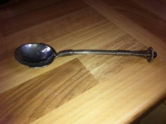 A E Jones, An Arts & Crafts Silver Rat Tail Caddy Spoon