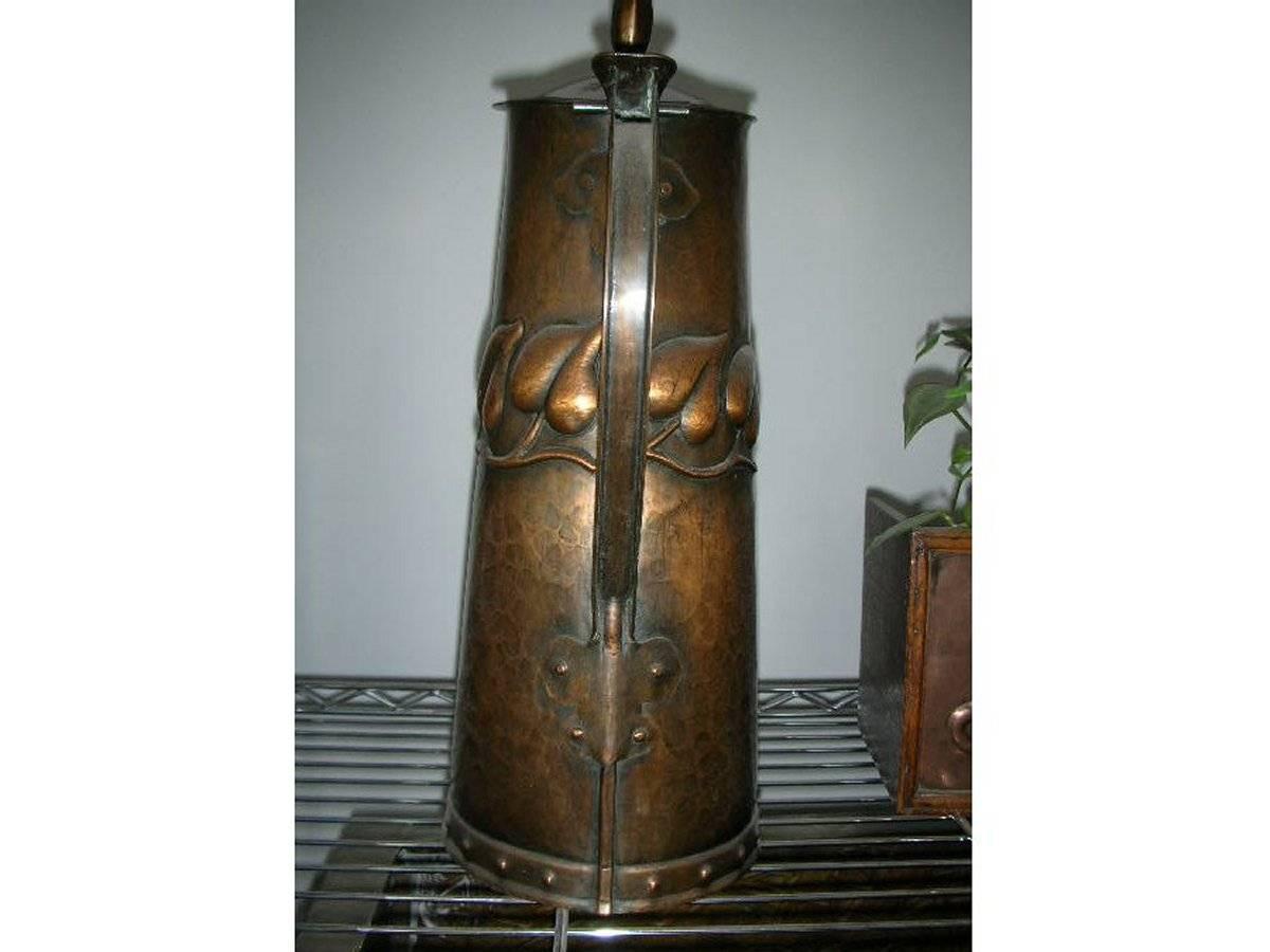 Arts and Crafts Arts & Crafts Copper Jug with Stylised Repousse Leaf Details