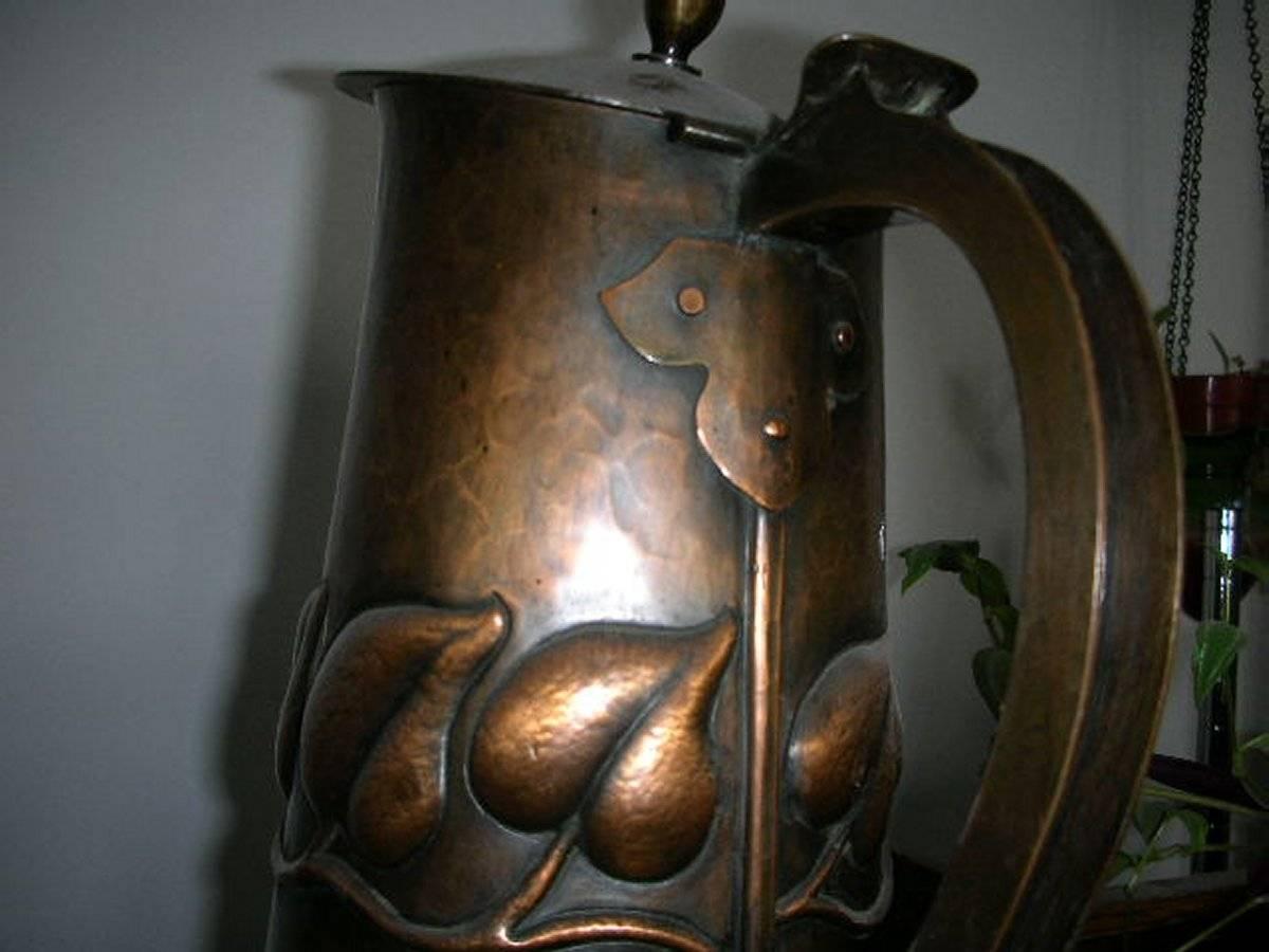 British Arts & Crafts Copper Jug with Stylised Repousse Leaf Details