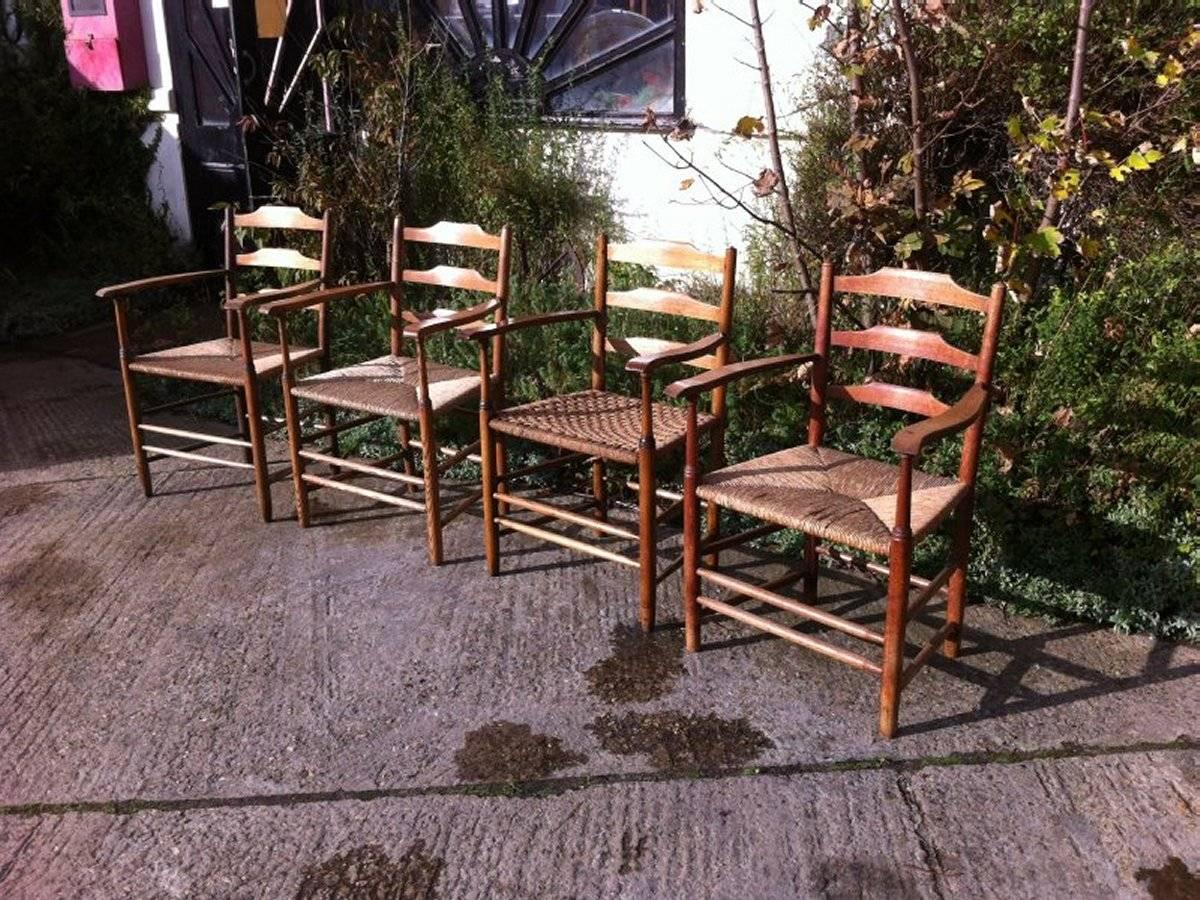 Edward Gardiner and Philip Clissett. A harlequin set of three Arts & Crafts Cotswold School ladder back armchairs. Two with newly woven rush seats.
Below is a run down on them looking at the main image from right to left:-
1.The one on the far right