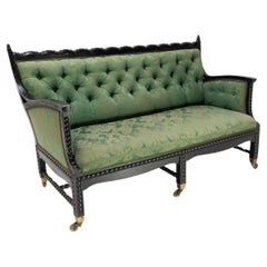 Philip Webb for Morris & Co. Aesthetic Movement Ebonised Settee with Bobbins