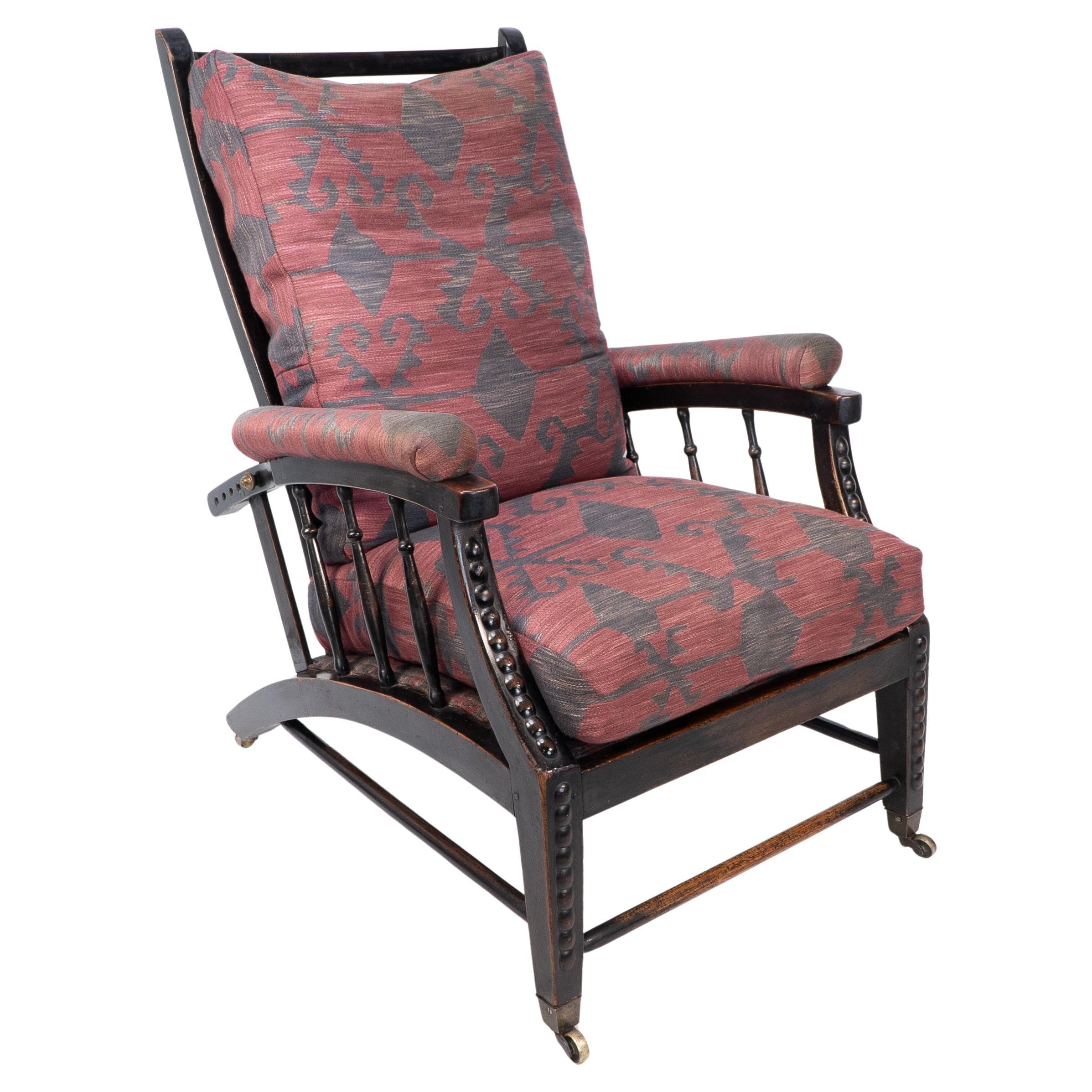 Phillip Webb for Morris & Co. an English Aesthetic Movement Reclining Armchair For Sale