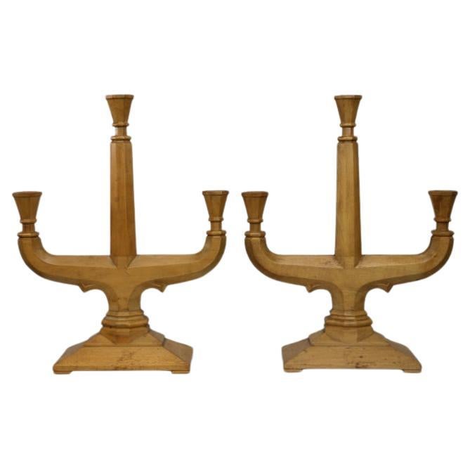 A good quality pair of subtle Gothic Revival hand crafted beech candelabras. For Sale