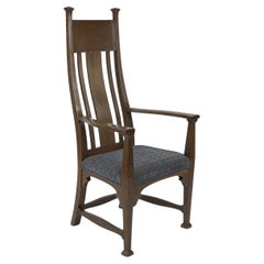 Used Norman & Stacey (attributed). An Arts and Crafts walnut high back armchair