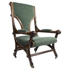 John Pollard Seddon Gothic Revival oak armchair with through pegged tenon joints