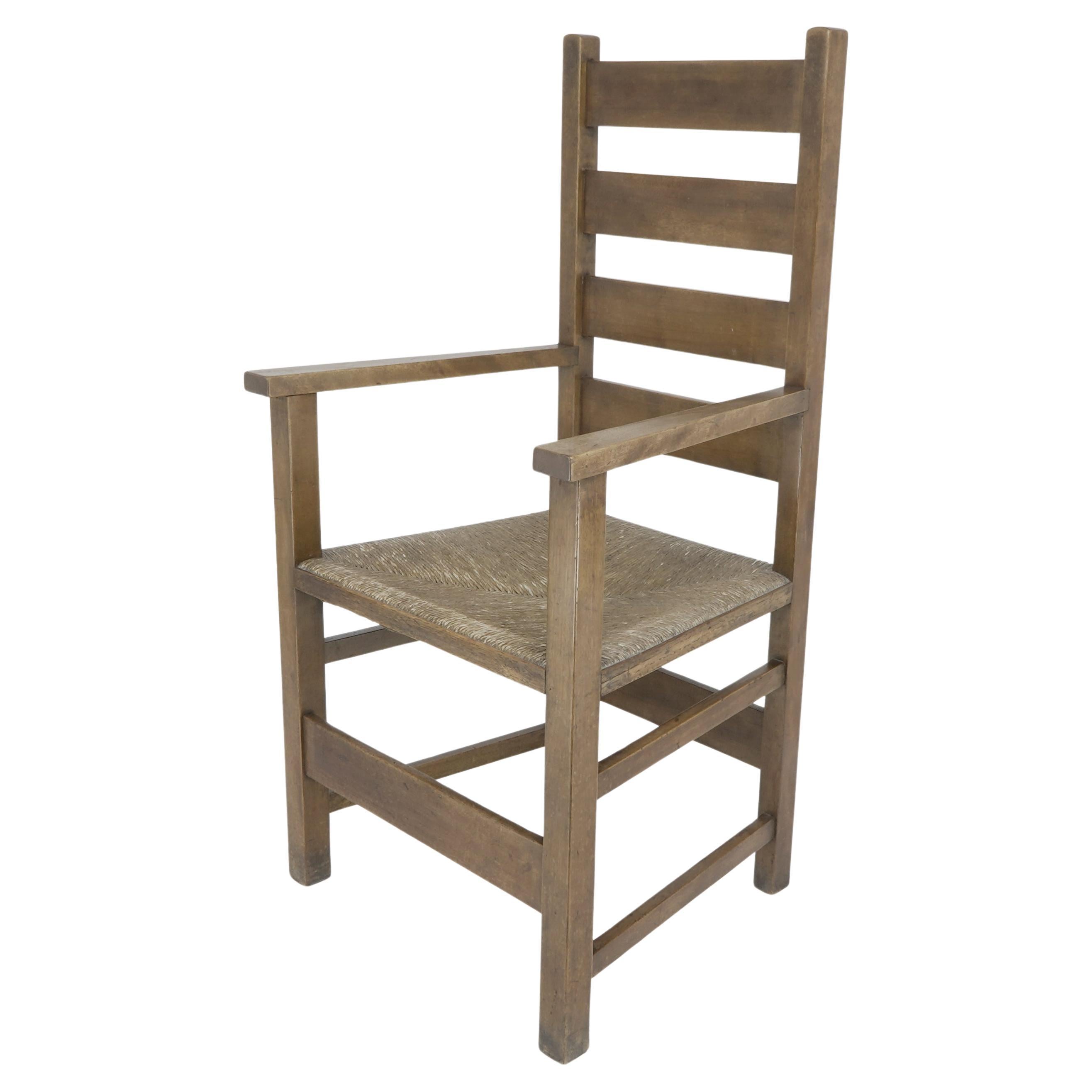 Baillie Scott for J P White. Arts & Crafts oak & rush seat ladder back armchair. For Sale