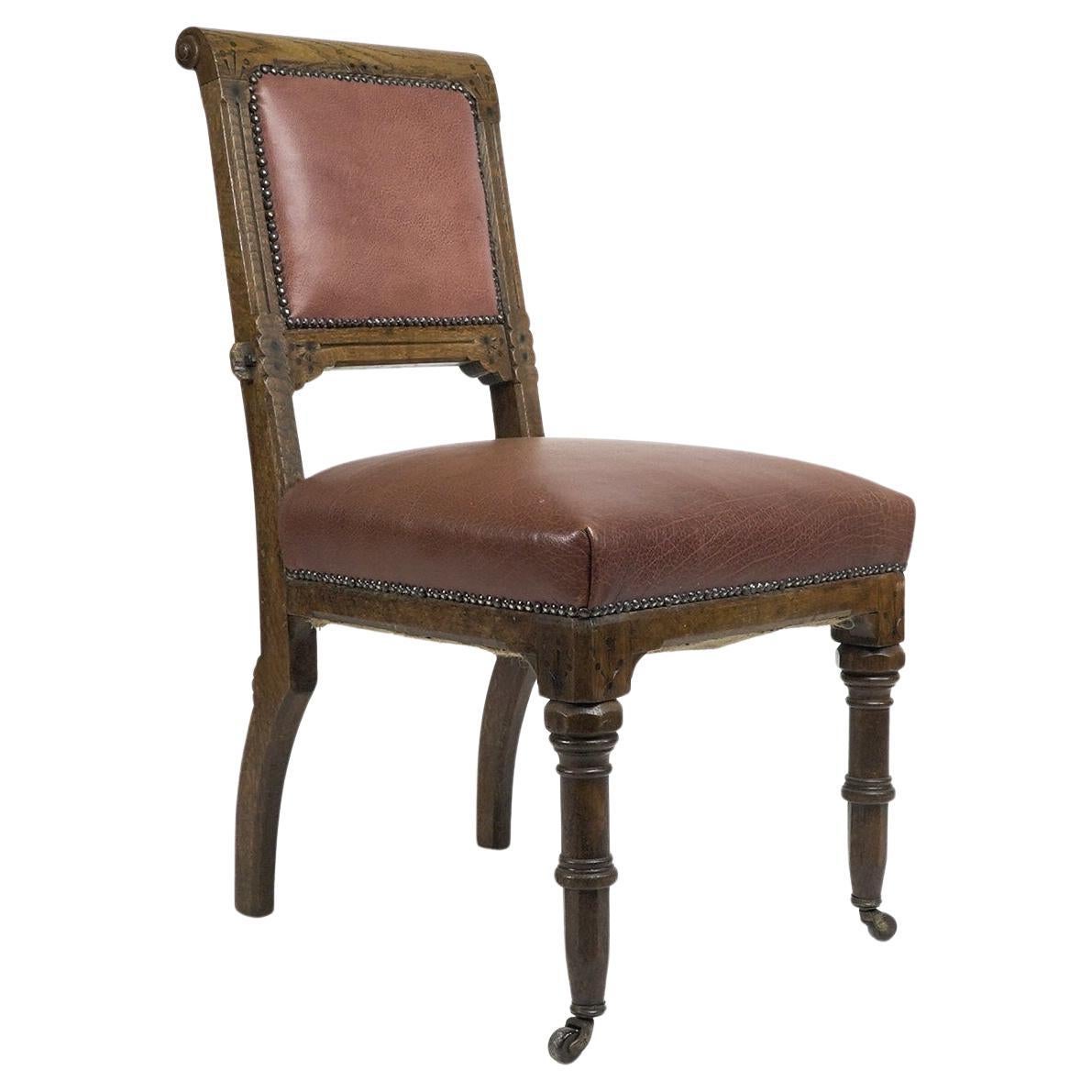 Charles Bevan attributed. A Gothic Revival side chair with scroll carvings For Sale