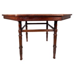 Antique E W Godwin attributed. An Aesthetic Movement Walnut octagonal centre table