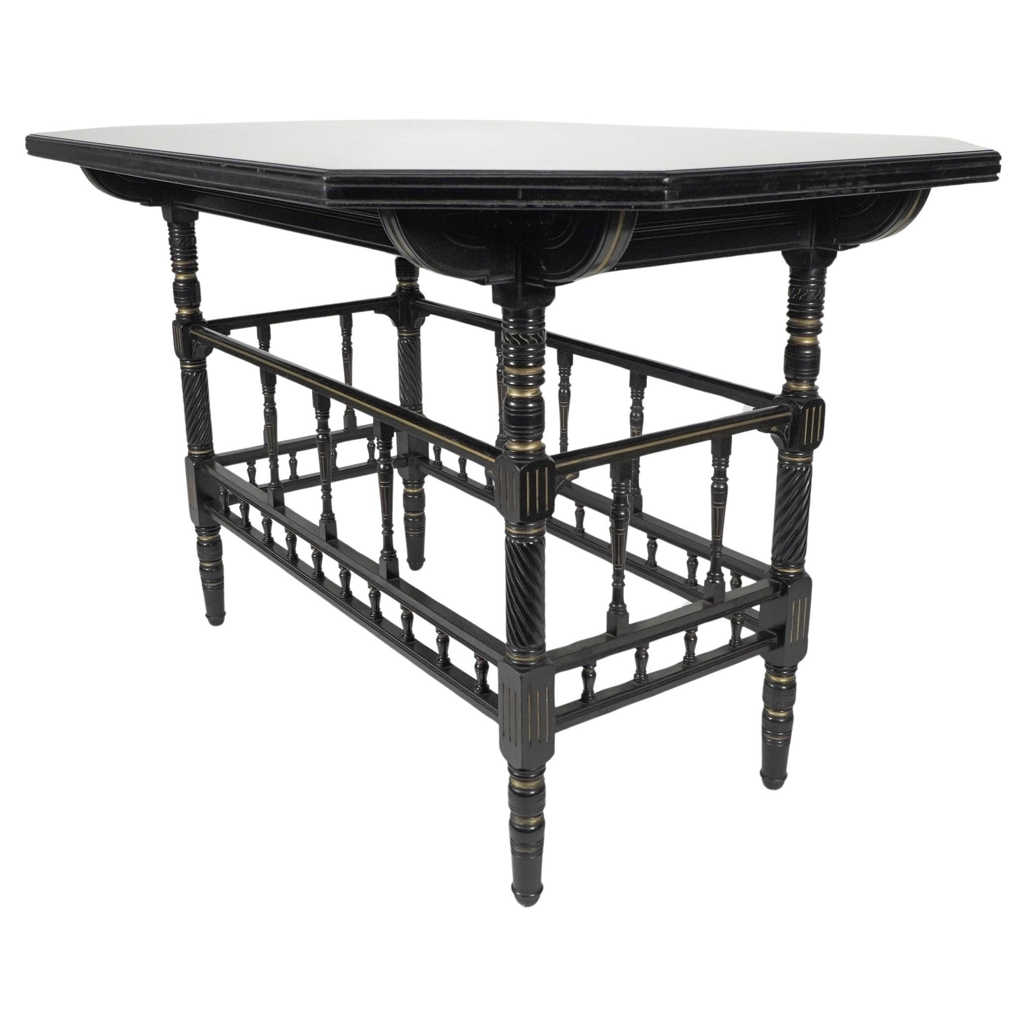 Gillows attri An Aesthetic Movement oblong ebonized & Gilded walnut centre table For Sale