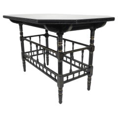 Antique Gillows attri An Aesthetic Movement oblong ebonized & Gilded walnut centre table