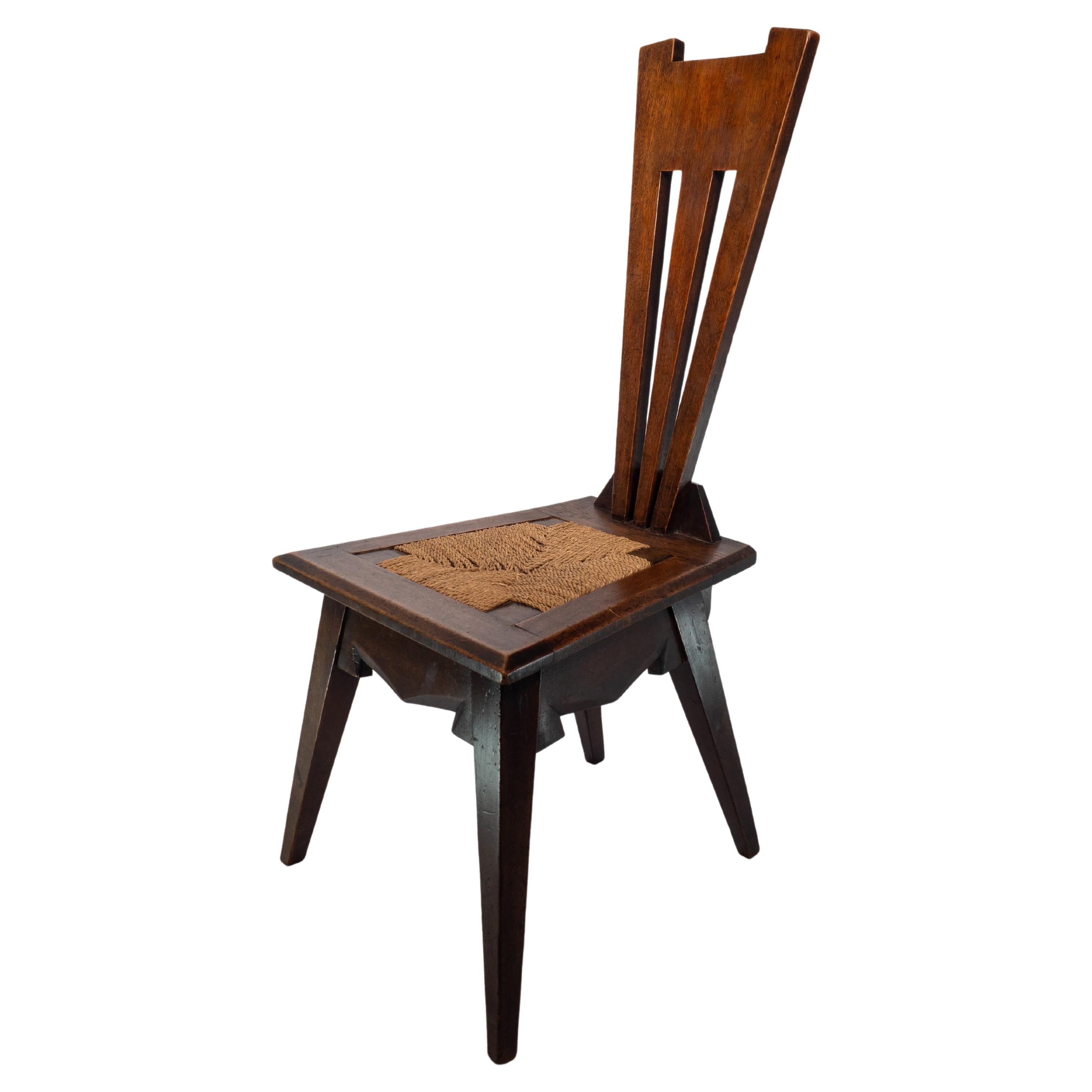 Liberty and Co. An Arts and Crafts Wiclif rush seat side chair. For Sale