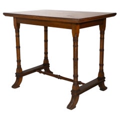 Aesthetic Movement oak oblong side table with ring turned legs, and splayed feet