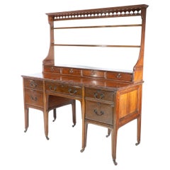 Morris and Co attributed. A subtle Anglo-Japanese walnut sideboard dresser