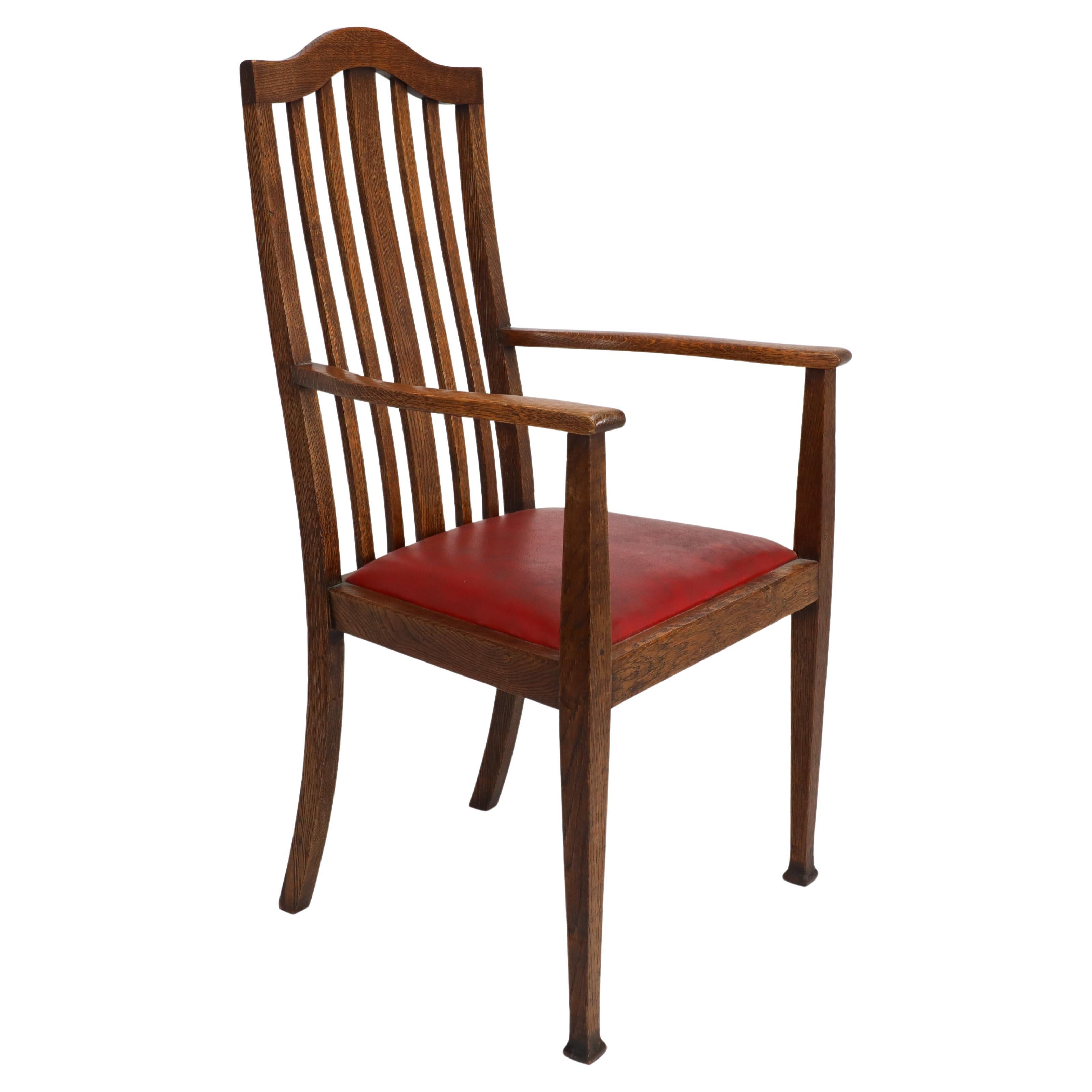 Three Arts and Crafts oak dining armchairs For Sale