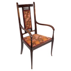 Das Café von George Walton für John Rowntree. Ein Sessel aus Nussbaumholz im Arts and Craft-Stil