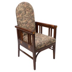 G M Ellwood for J S Henry. A Progressive New Art armchair with fruitwood inlays