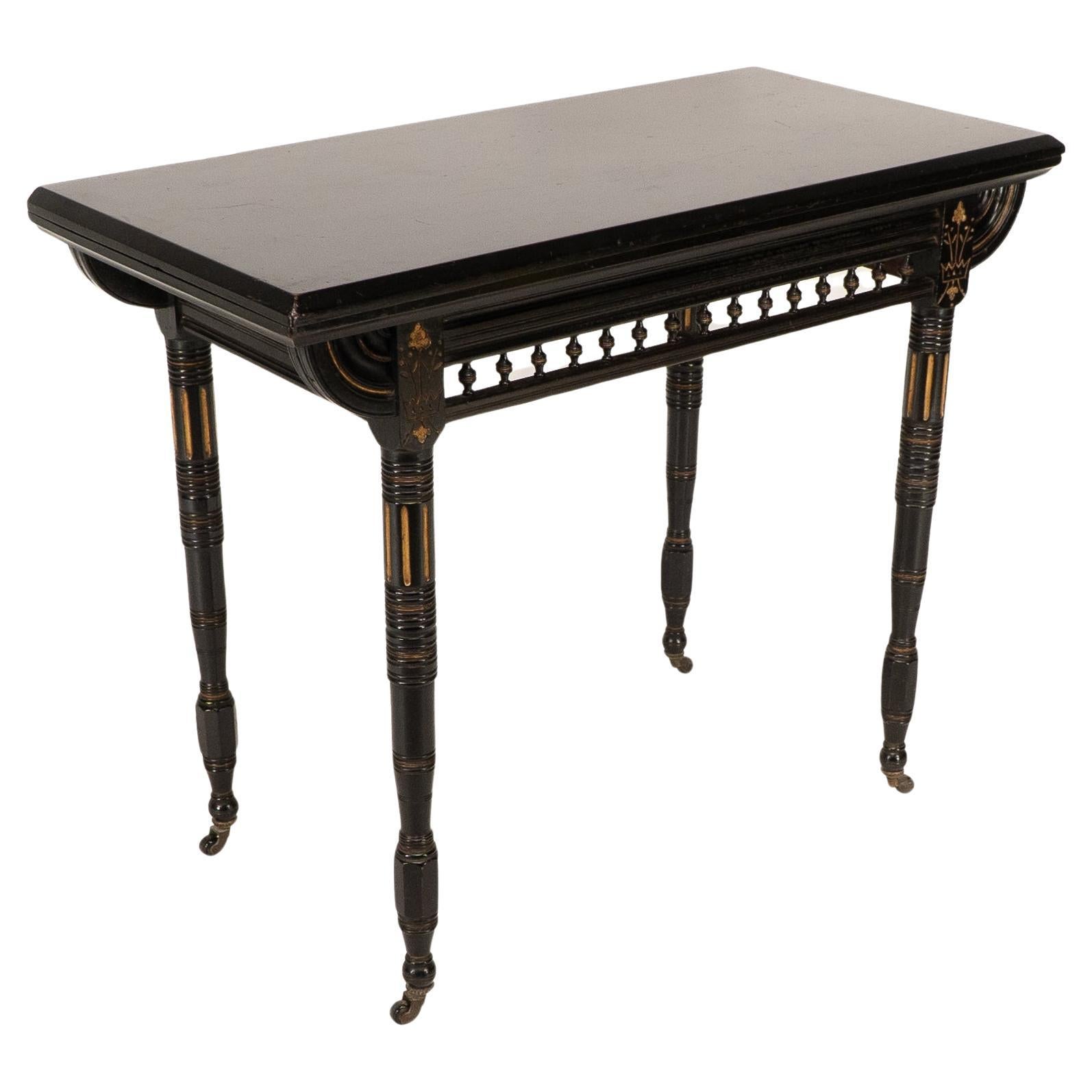 Gillows attributed. An Aesthetic Movement ebonized games and card table For Sale