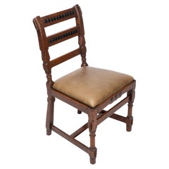 J P Seddon attri. An Aesthetic Movement oak side chair with ebonized circles