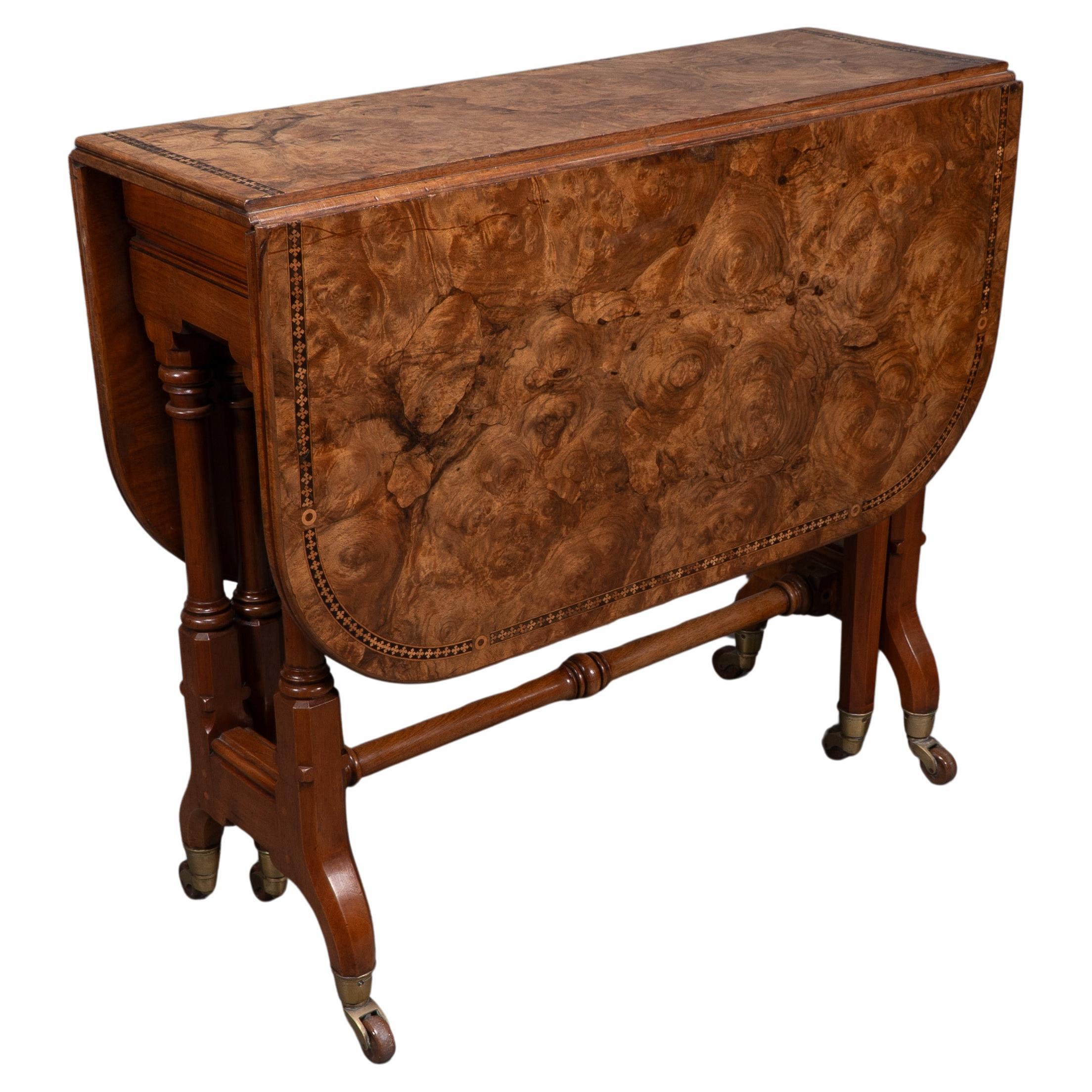 Charles Bevan for Marsh & Jones. A Gothic Revival burr walnut Sutherland table For Sale