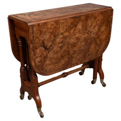 Charles Bevan for Marsh & Jones. A Gothic Revival burr walnut Sutherland table