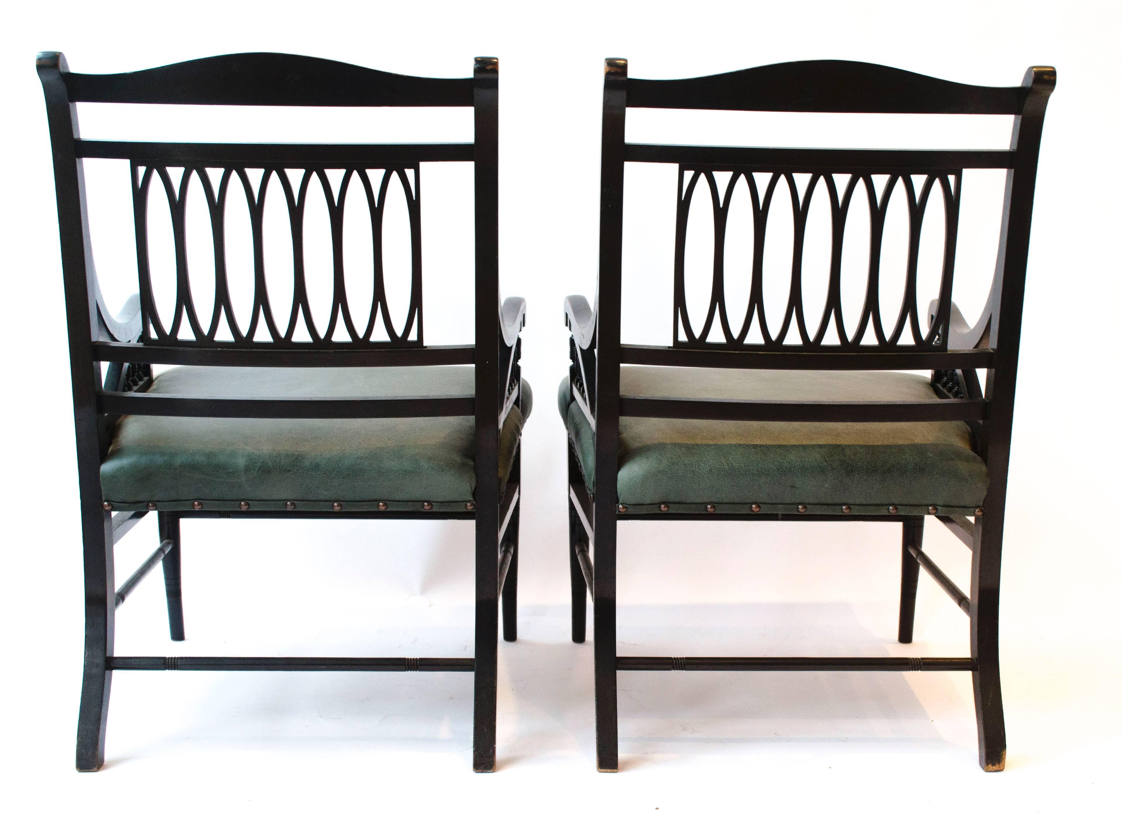 Pair of Anglo-Japanese Ebonized Open Armchairs. Attributed to Jas Shoolbred In Good Condition For Sale In London, GB