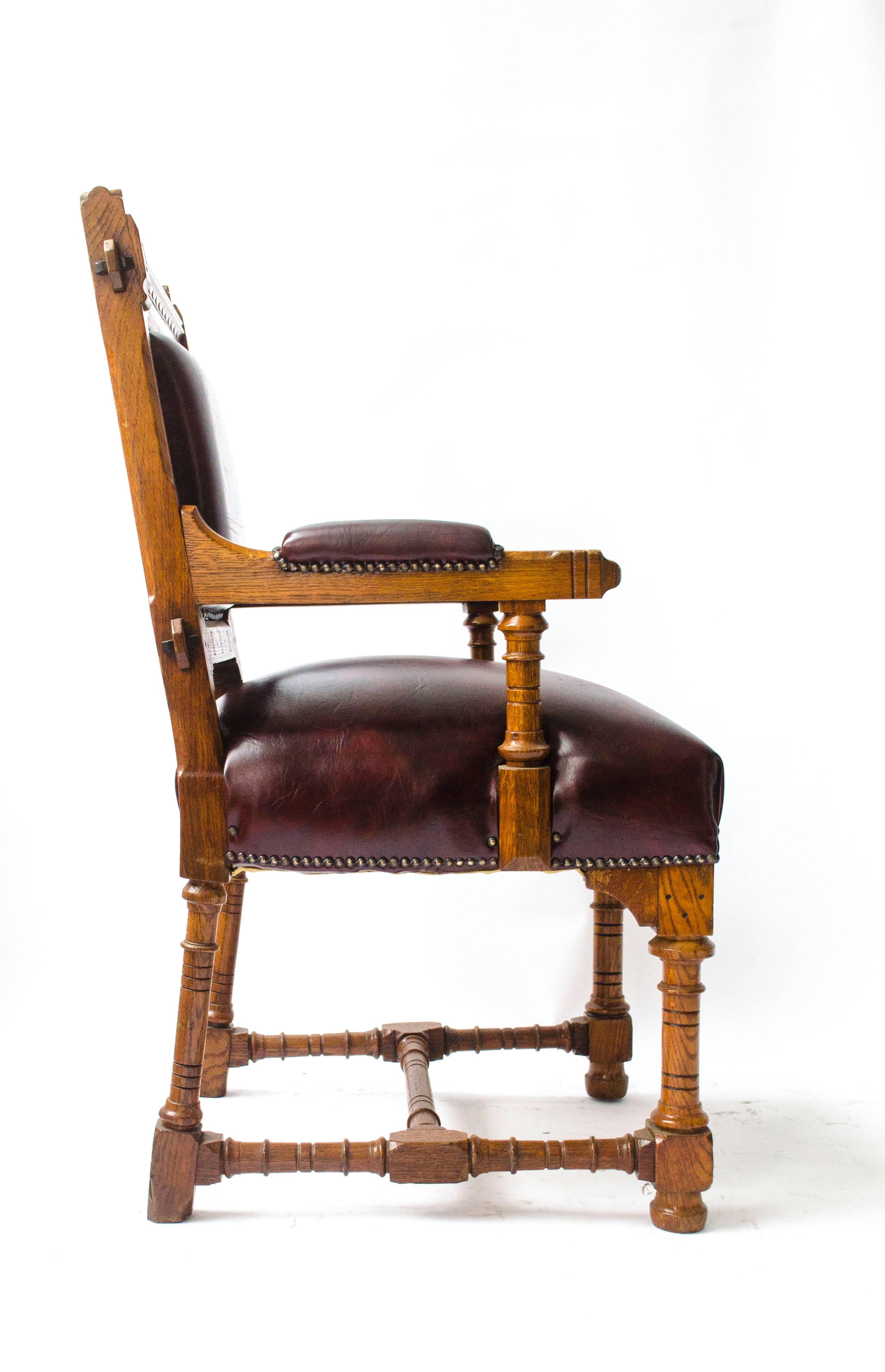 A Gothic Revival oak armchair designed by John Pollard Seddon, made by his family firm Thomas Seddon (Seddon and Co). Based in Bond Street, they supplied furniture to Windsor castle and Buckingham Palace, founded by his Great Grandfather George