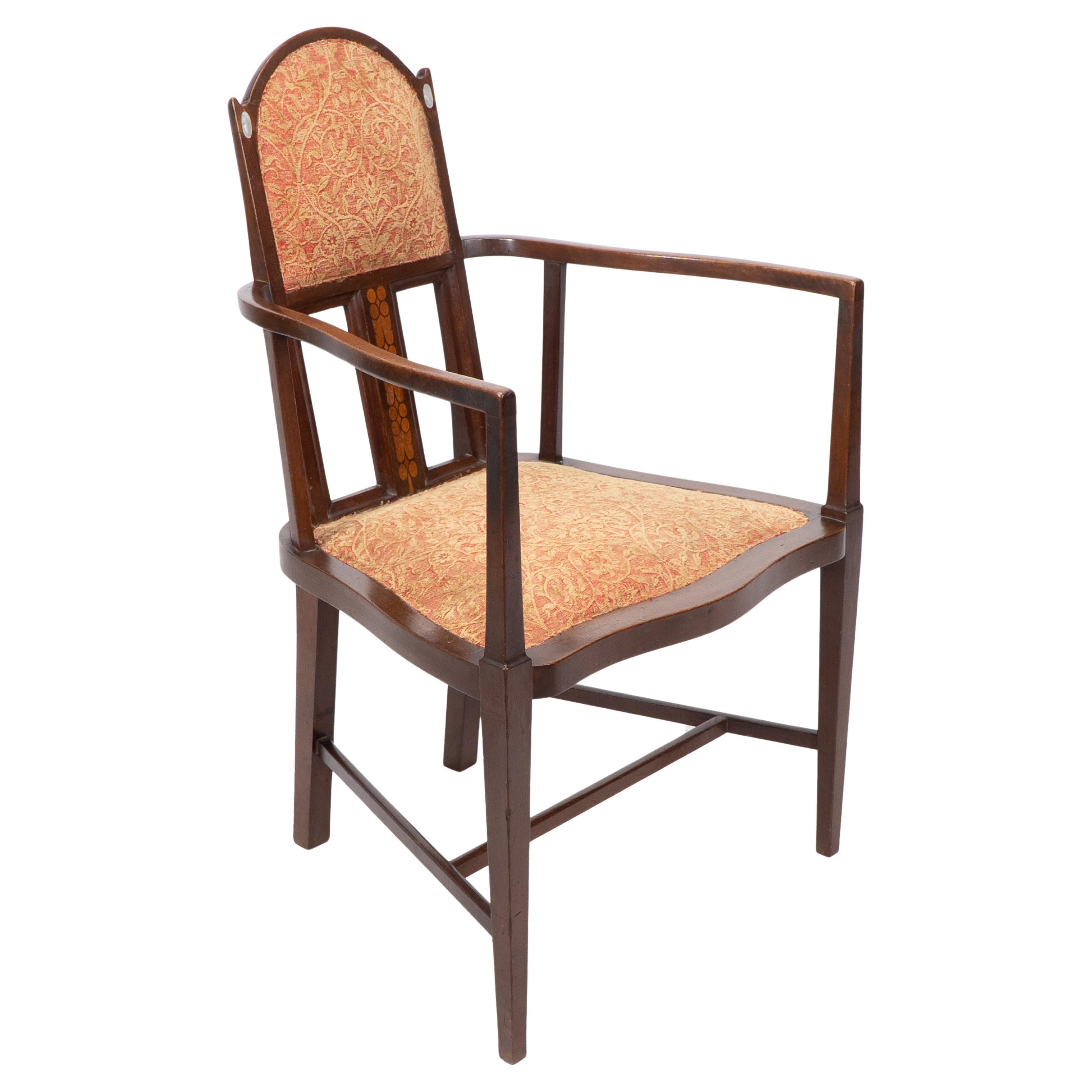 G M Ellwood for J S Henry. Arts & Crafts armchair with mother-of-pearl inlays