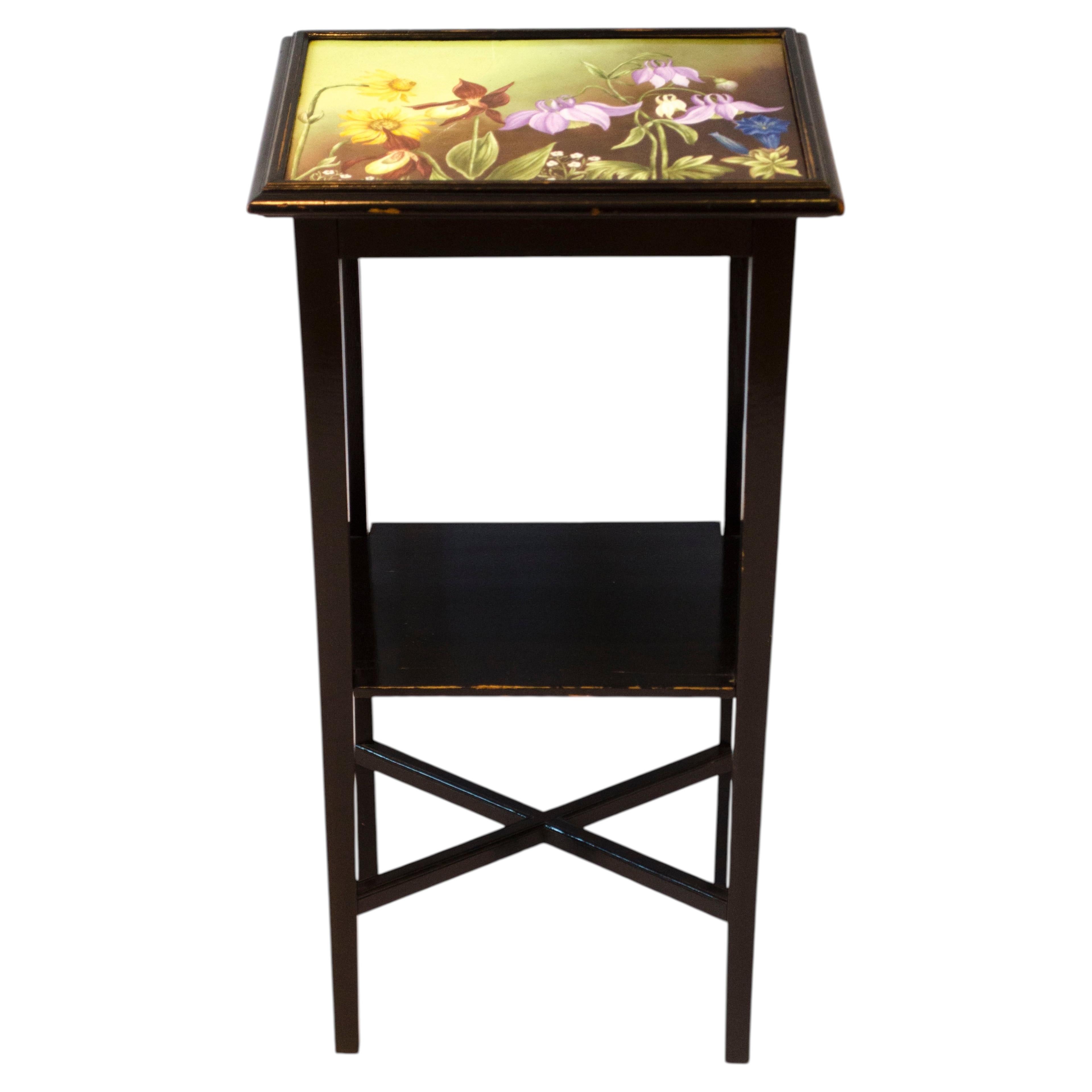 Aesthetic Movement ebonized side table with hand painted floral tile to the Top