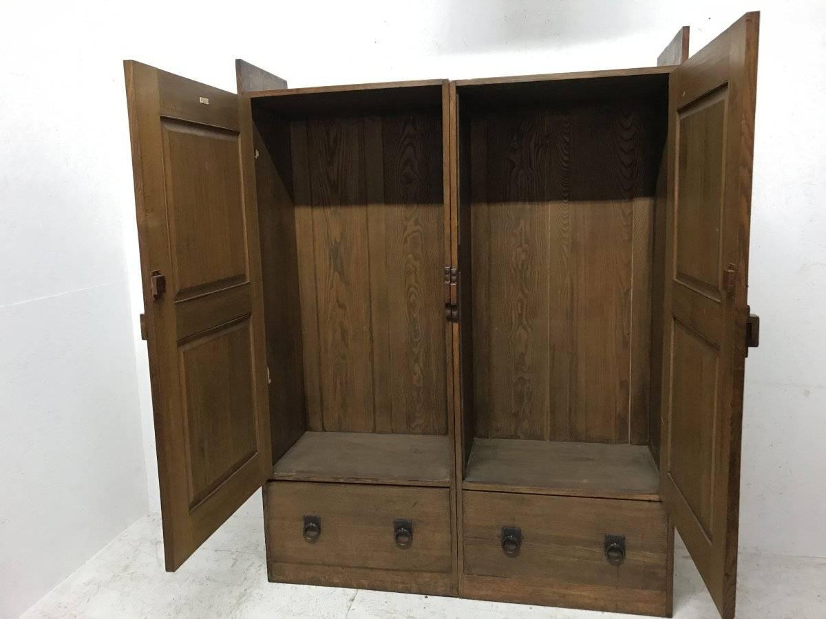 Hand-Crafted Wylie & Lochhead. A Large Arts & Crafts Oak Wardrobe With Stylised Iron Hinges