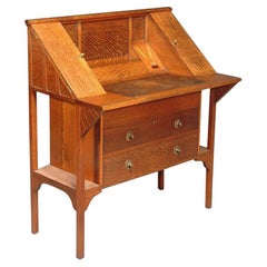 G M Ellwood pour J S Henry. Bureau en chêne de style Arts & Crafts