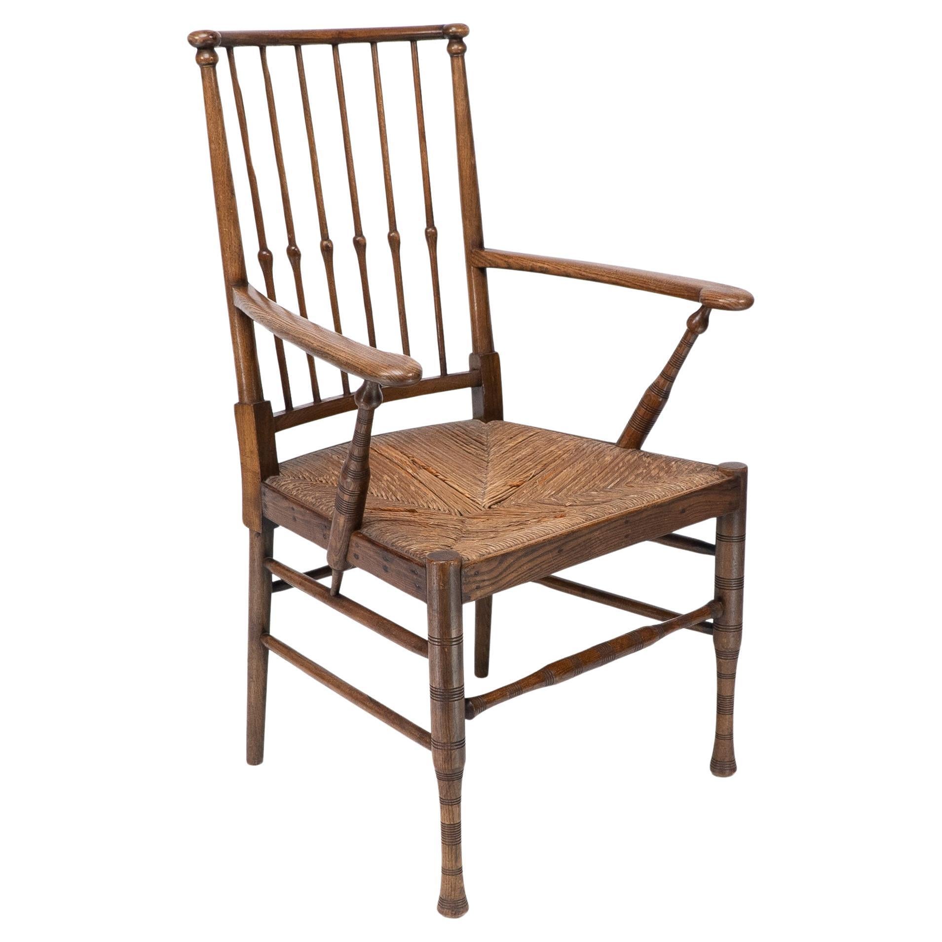Two Liberty and Co Egyptian Style Thebes Rush Seated Armchairs For Sale