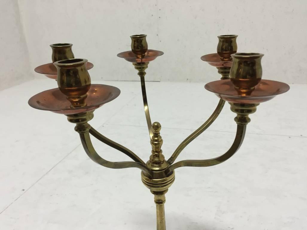 William Arthur Smith Benson. A rare Arts and Crafts Brass and Copper Five Branch Candelabra. 
A classic design statement from the most important British lighting designer of the Arts and Crafts Movement.
Stamped Benson to one foot.