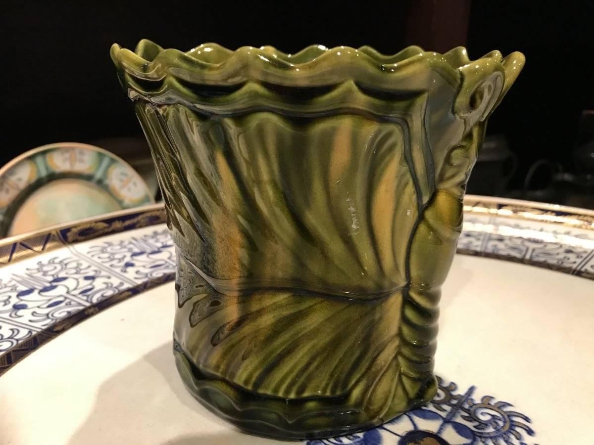Dr. Christopher Dresser (1834-1904) for Ault, a butterfly moulded cache pot, green-yellow glazed, impressed and moulded mark, no. 312.