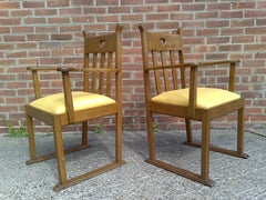 Pair Oak Armchairs, in the style of Liberty & Co with heart Cut-Out to the backs