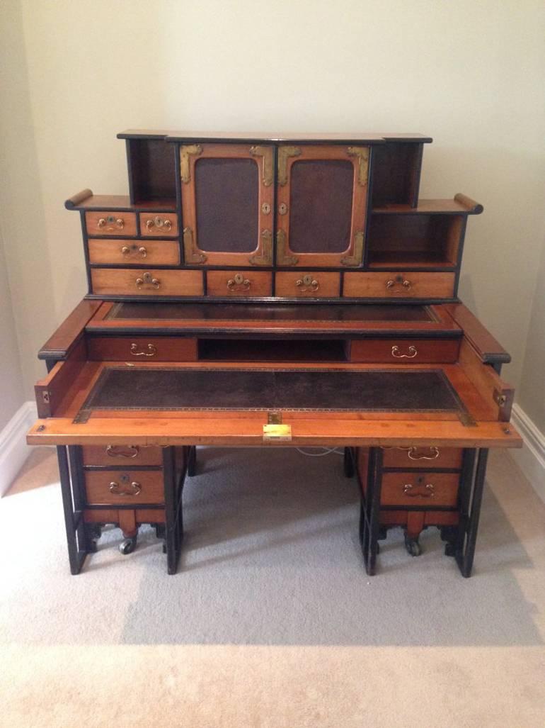 A fine and rare walnut desk in the Anglo-Japanese style designed by Thomas Jeckyll and made by Charles Hindley and Sons.
“Thomas Jeckyll designed some of the earliest surviving furniture inspired in decoration if not in form- by interest in Japan”