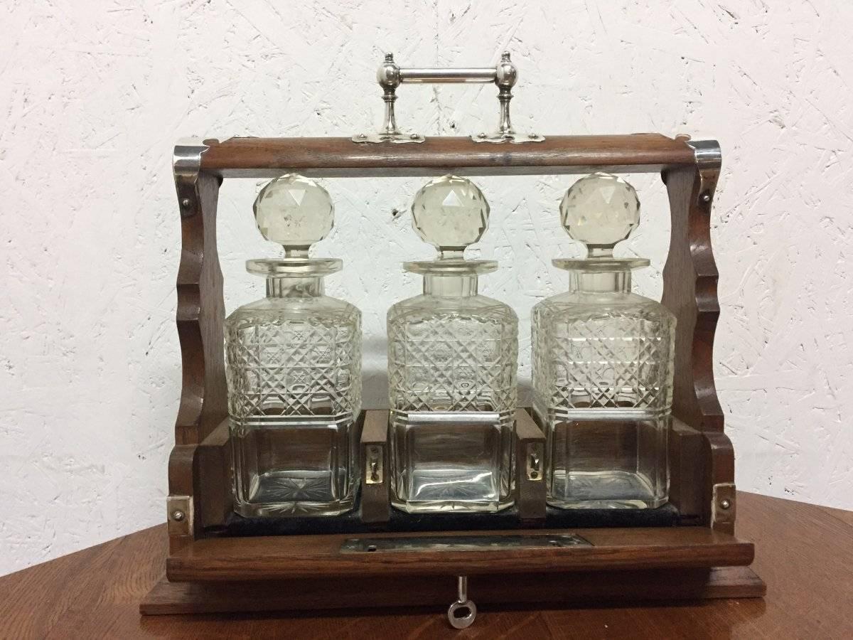 English Late Victorian Gothic and Aesthetic Oak Triple Decanter Set