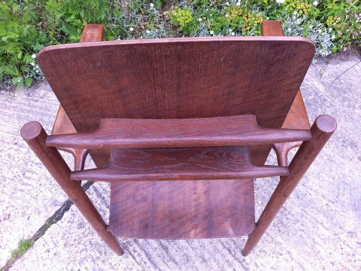 Mid-20th Century A Scandinavian Style Designer Solid Oak Armchair with a Laminated Back and Seat. For Sale