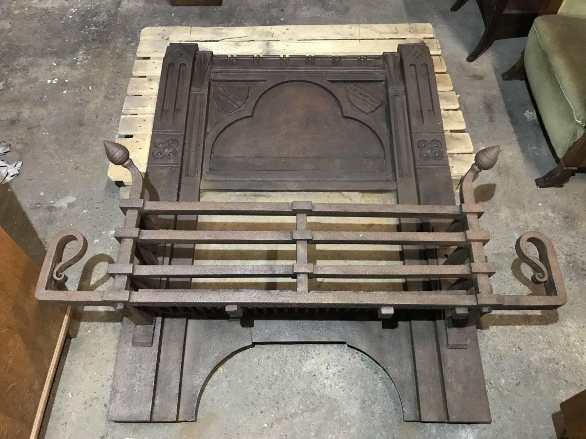 William Burges Made by Francis Skidmore. A rare and important Gothic Revival cast iron fire place insert.