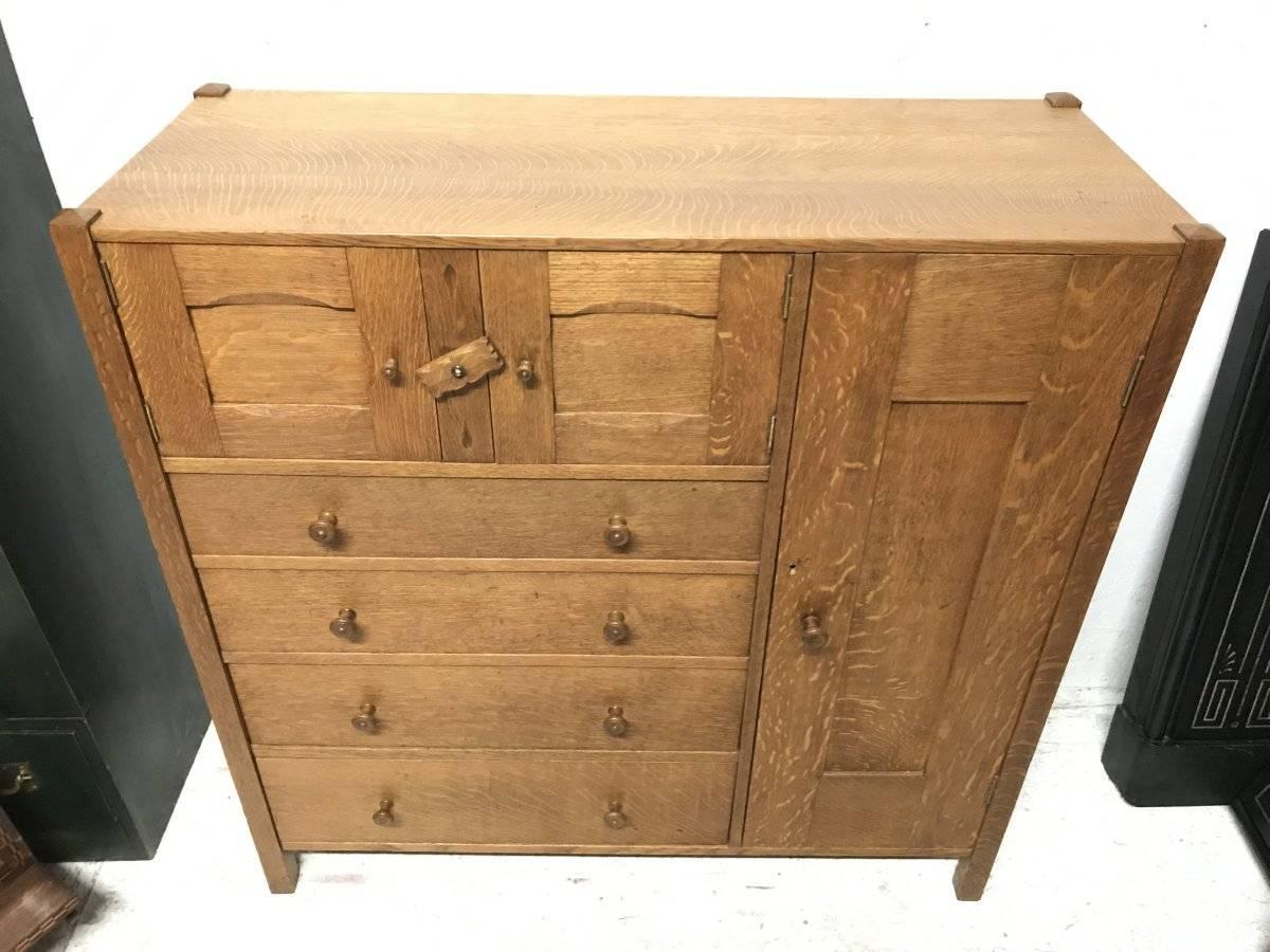 Ambrose Heal Letchworth oak compactum nursery chest of drawers.