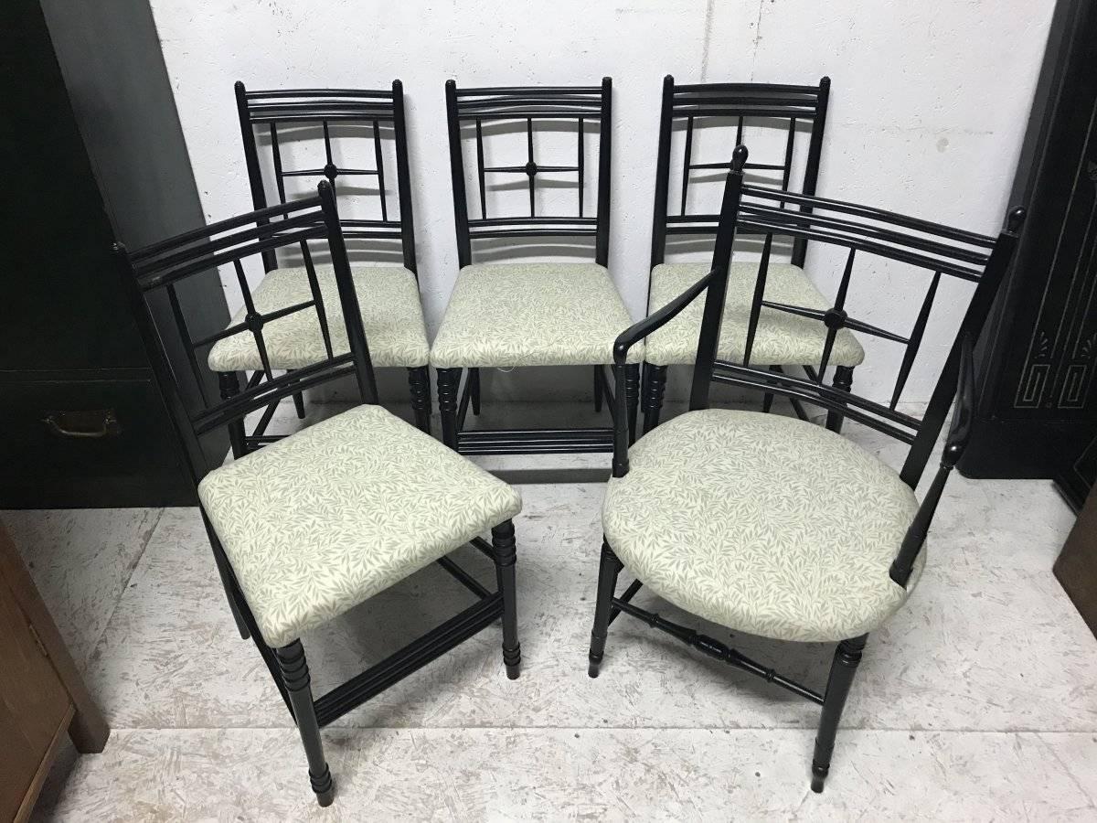 Morris and Co. Ford Maddox Brown. A rare set of five Arts and Crafts ebonized star back Sussex chairs. Consisting of one armchair and four singles covered in a Morris Vine fabric.
Armchair measures: Height 35