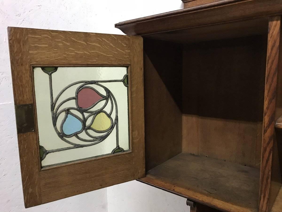 Arts and Crafts Liberty & Co. Arts & Crafts Oak Bookcase Stain Glass and Copper Hinges & Handles