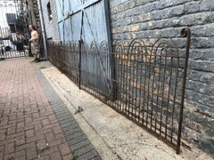 Four Georgian Wrought Iron Railing Lengths with Hand-Formed Circular End Finials